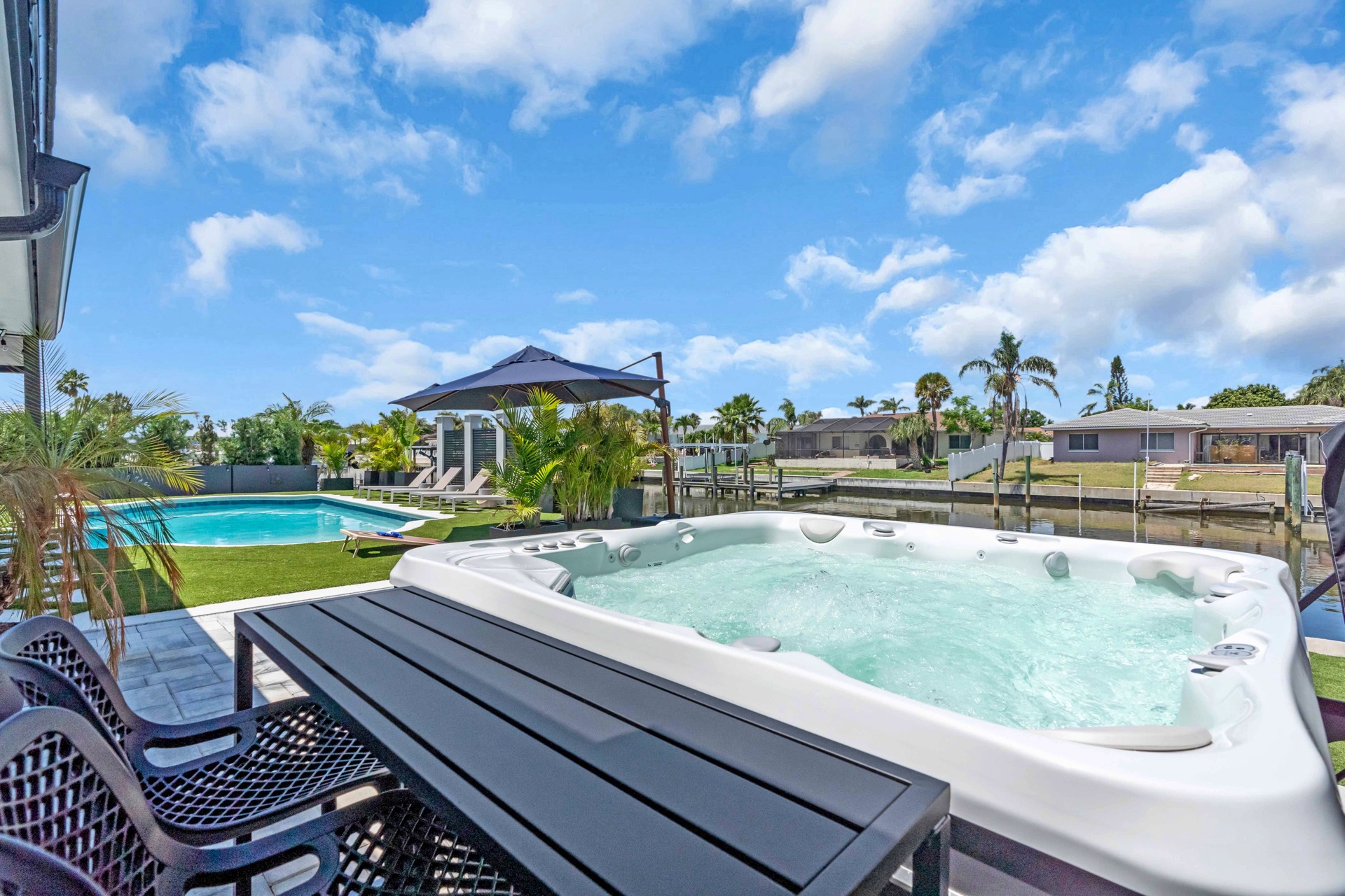 7-person hot tub overlooking Tampa Bay canal
